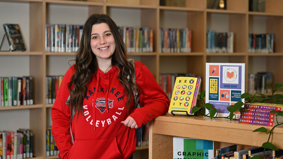 Smiling student in the library