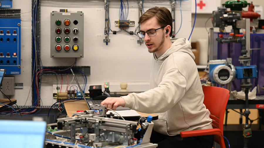 A student working on their laptop