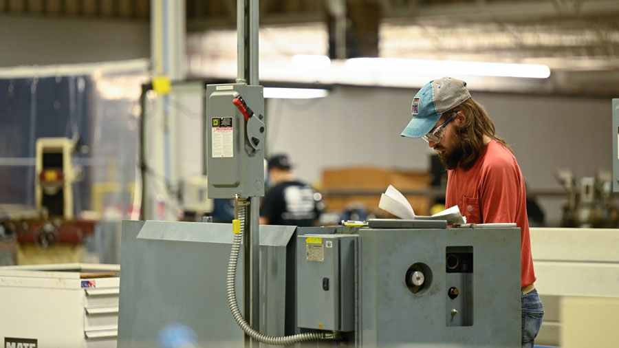Student working on a metal lathe