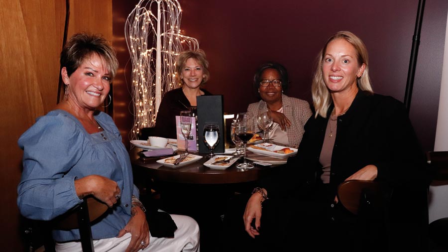 Another table of four enjoying a KCC Foundation event.