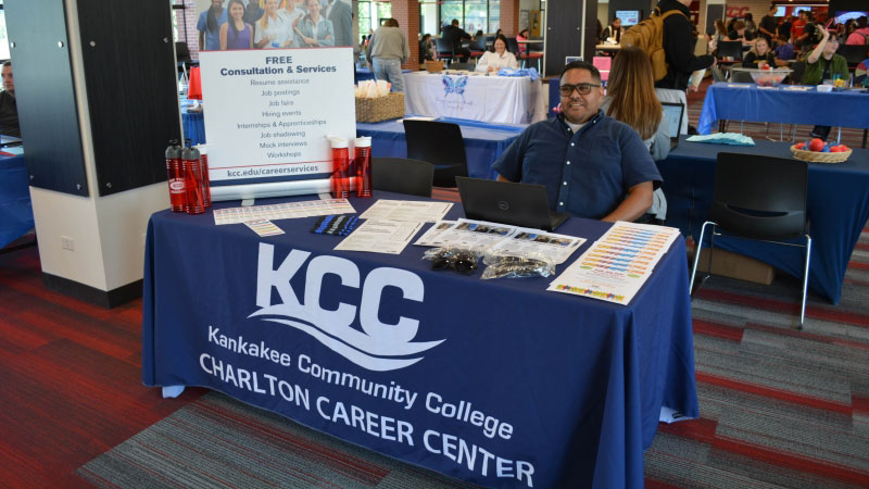 Director of Continuing Education Cesar Avalos promoting the Charlton Career Center at his table