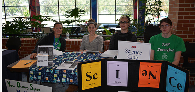 Four students at the Stem Clubs table at club rush